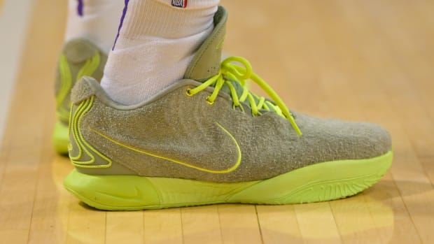 Los Angeles Lakers forward LeBron James' green Nike sneakers.